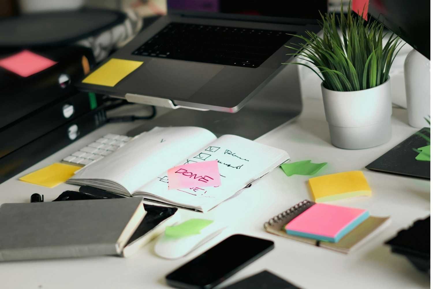Organized Workspace with Checklists and Laptop (1)