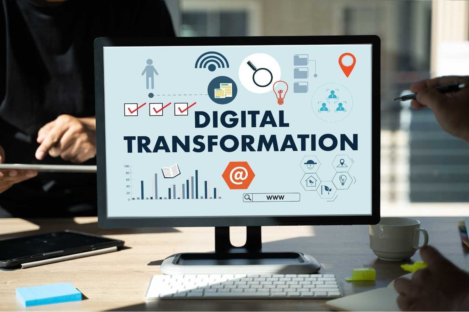 Businessman using a digital device Digital Transformation concept digitization of business processes