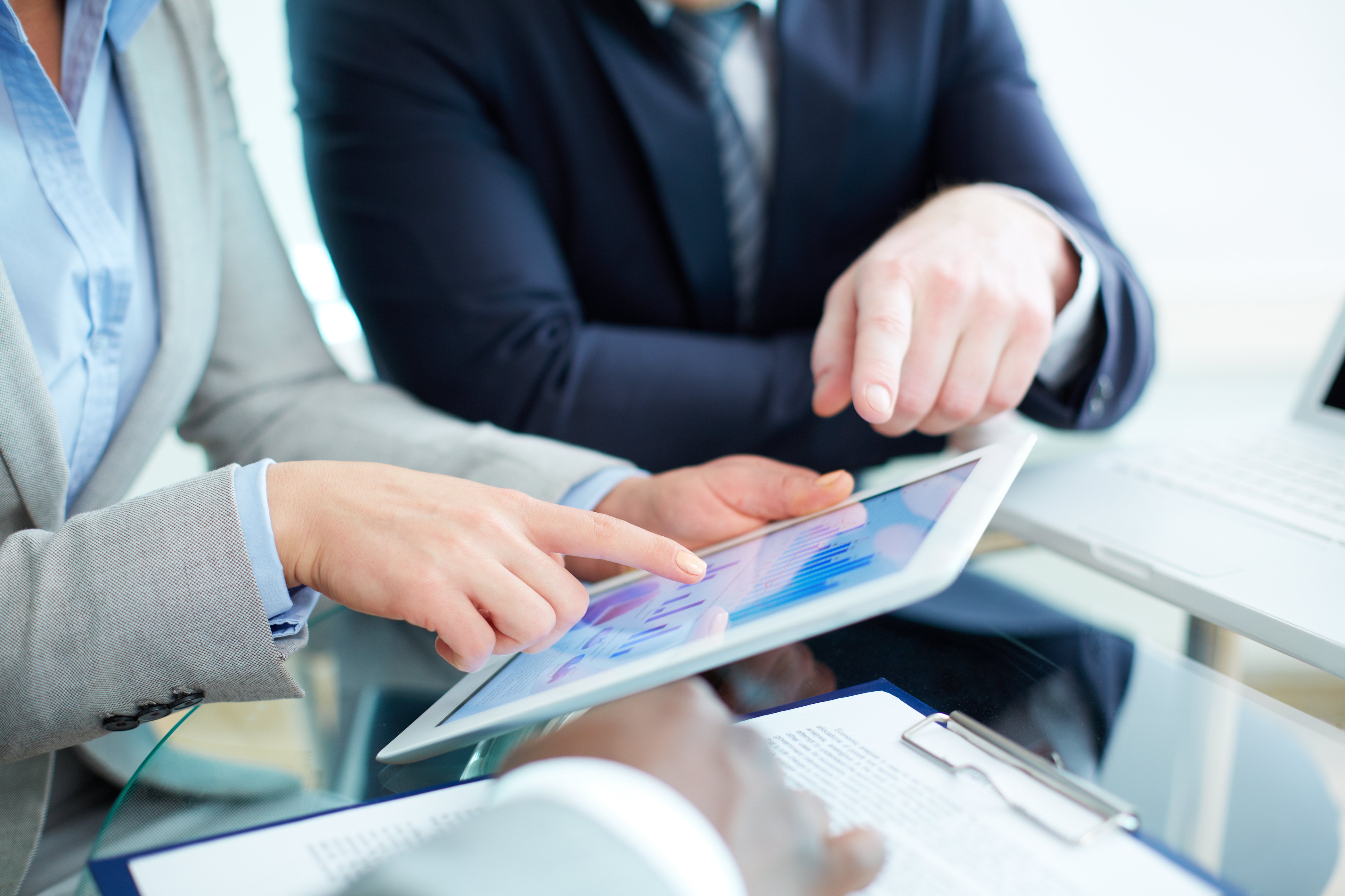 Image showing Close-up of businesswoman pointing at digital tablet