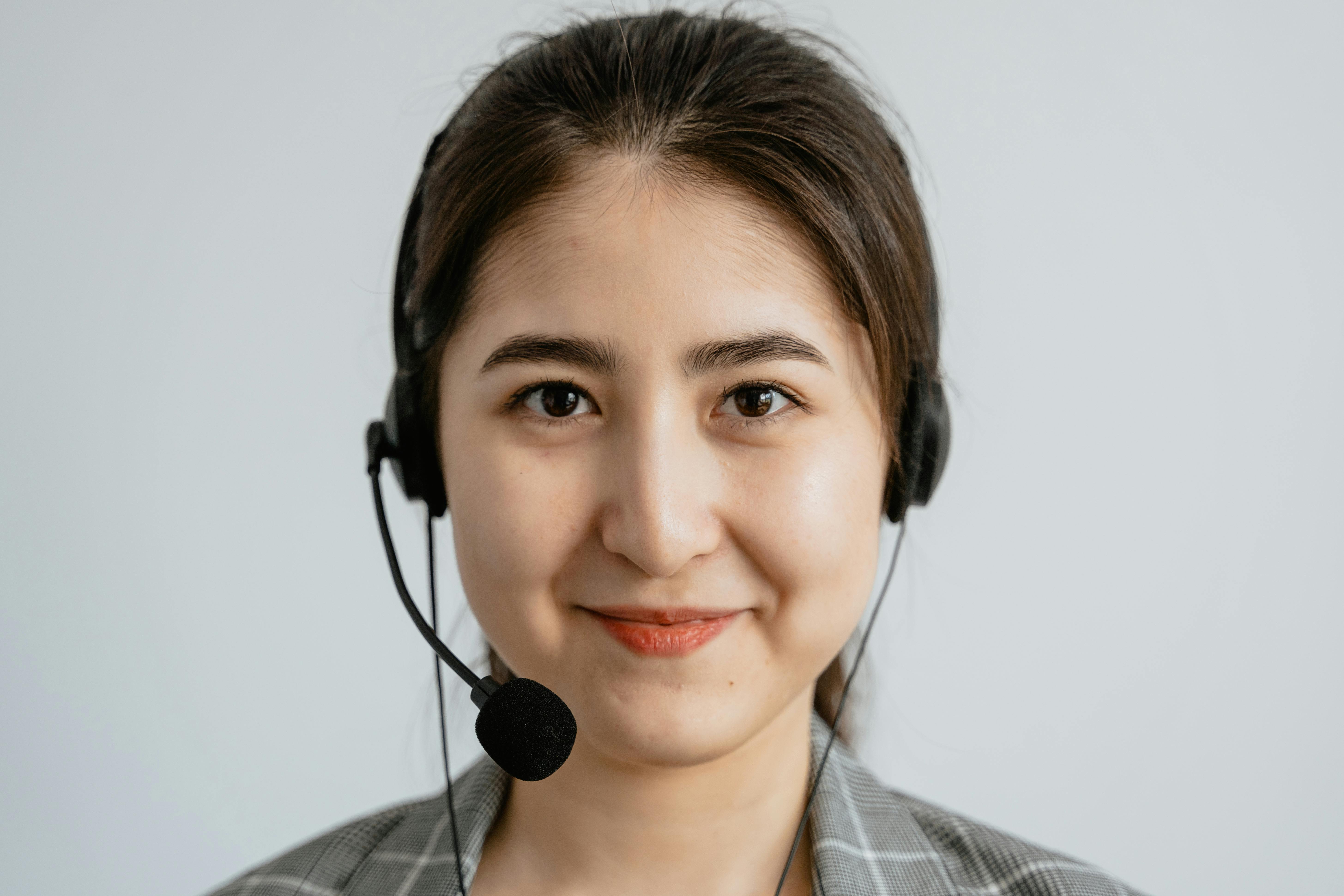 Headshot of friendly virtual assistant ready to help.