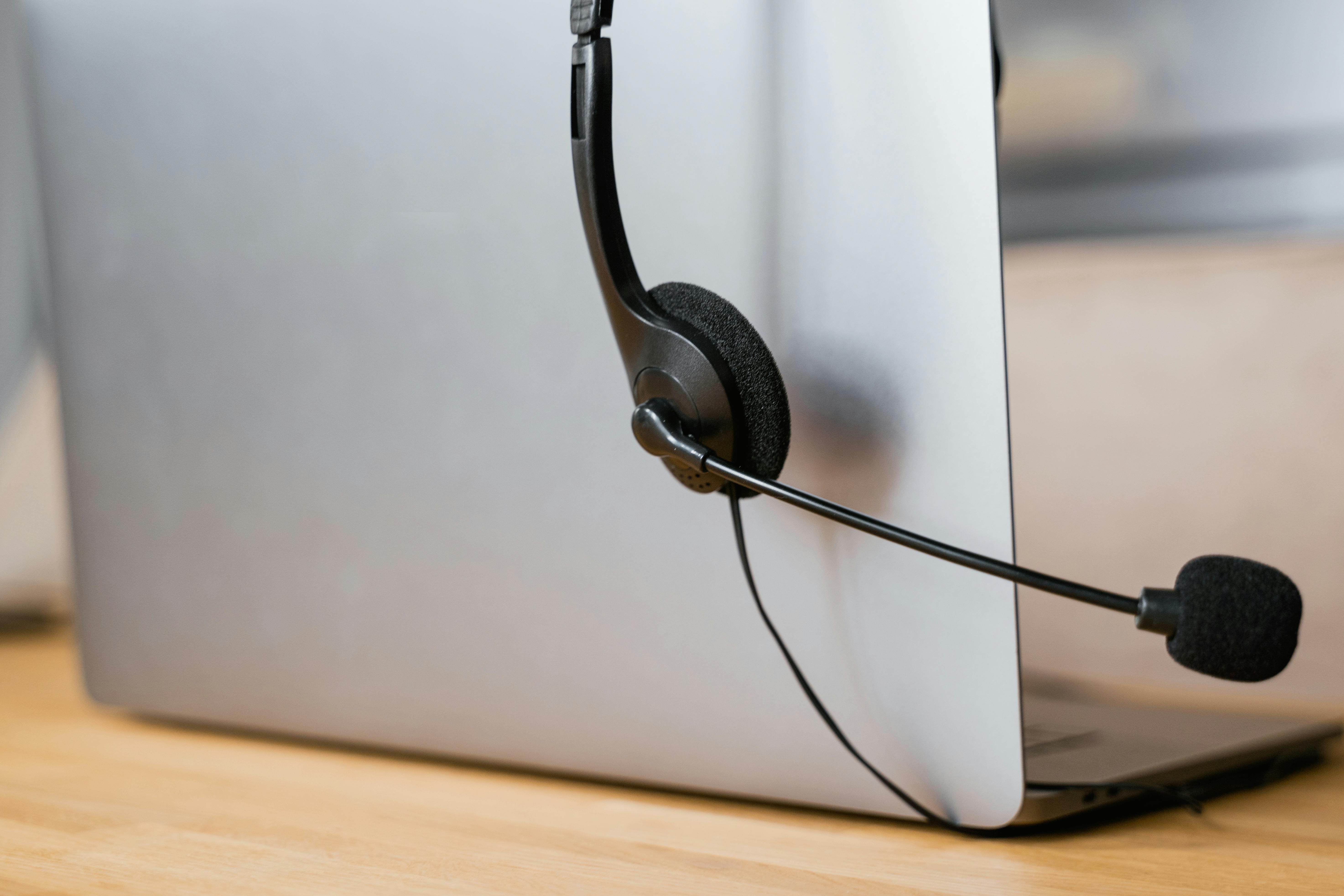 Work headset on computer symbolizing virtual assistant and remote work setup